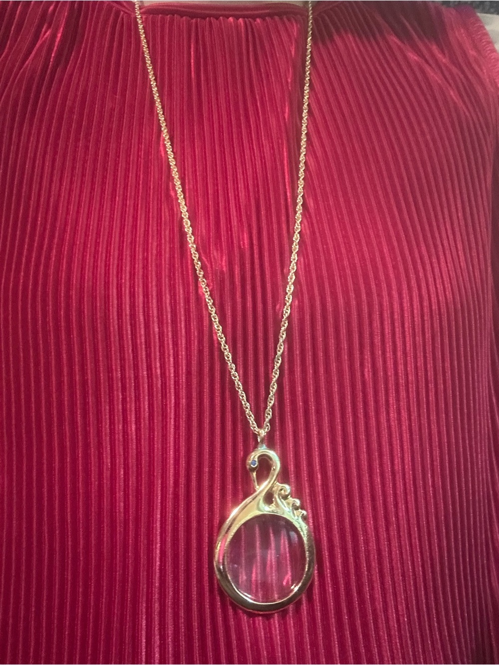 Avon Gold swan magnifier necklace